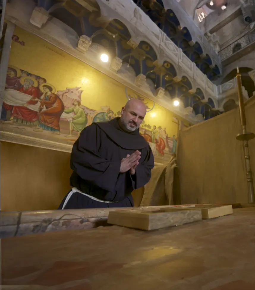 Fr. Rami places and blesses the Unity Set and the Trio Stones