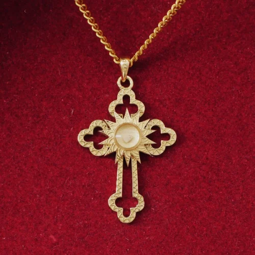 Gold Cross Pendant on Felt